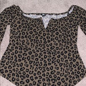 Over the shoulder animal print blouse